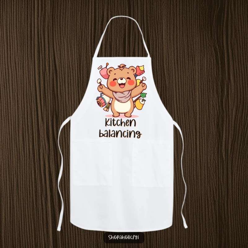 Funny Bear Apron: A smiling bear character precariously balancing several items, offering protection with a humorous touch.