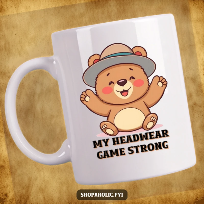 Funny mug with a joyful bear gleefully trying on an oversized hat, celebrating fashion and humor.
