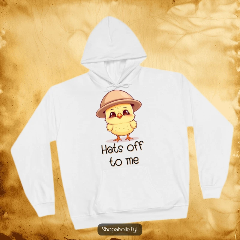 Funny chick with a wide grin, sporting a comically oversized hat, a soft and humorous hoodie for fashion lovers.