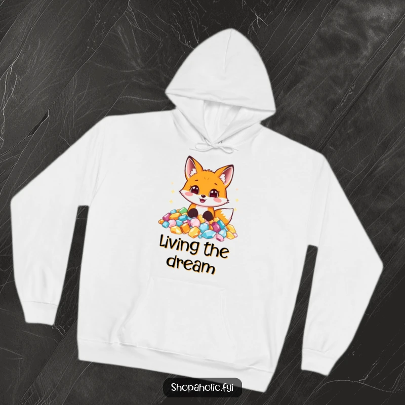 Funny hoodie with a delighted fox nestled in a huge pile of shimmering, precious jewels, radiating happiness and wonder.