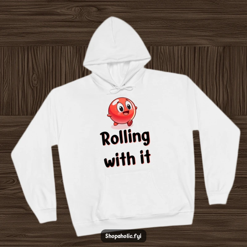 Funny hoodie illustration of a red bouncing ball character rolling with great speed and excitement towards a glowing, attractive display of goodies.